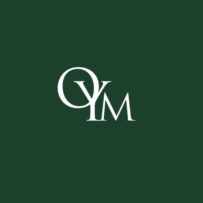 White logo with 'OYM' on a green background