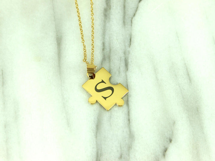 Gold Puzzle Piece Necklace